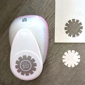 Scrapbooking punch for a 16 mm Brad